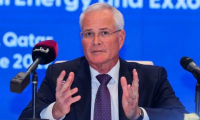 Exxon Mobil Corporation's Chairman and CEO Darren Woods speaks during a press conference and signing ceremony at QatarEnergy headquarters in Doha, on June 21, 2022