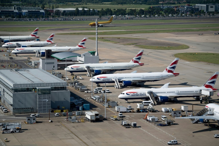 British Airways planes are seen here at Heathrow Airport -- a strike called for the summer there by BA staff has been called off after an improved pay offer