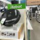 Amazon said it will buy iRobot for $61 per share along with acquiring the company's debt