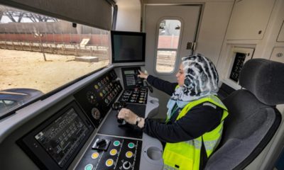 Hind Omar, shown in a full-size train simulator, is one of the first two women hired to take the controls of trains on Cairo's metro