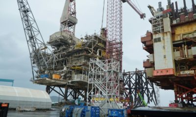 Three gigantic disused platforms are being taken apart bit by bit