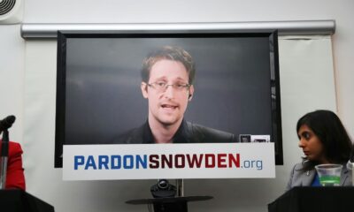 Edward Snowden speaking via video link at a news conference for the launch of a campaign calling for then president Obama to pardon him in September 2016 in New York City