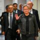 Jensen Huang, cofounder and CEO of Nvidia, waves as he arrives for a media roundtable in Kuala Lumpur on December 8, 2023