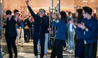Apple CEO Tim Cook attended the opening of his company's newest store in Shanghai, amid growing worries over the iPhone maker's market share in China